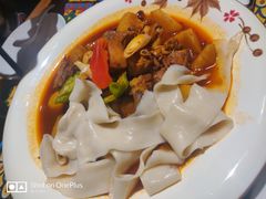 沙湾大盘鸡-西域盛宴烧烤新疆菜清真餐厅(古美店)
