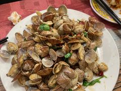 辣炒蛤蜊-1910老鲁味海鲜·戳子肉·青岛菜(金沙滩店)