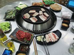 -彝人部落火盆烧烤(原内环足球场店)