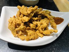 -明何记涮牛肚(品牌首店隋唐植物园南门古城路店)