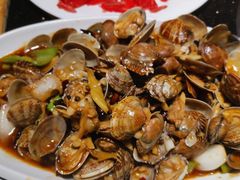 -明何记涮牛肚(品牌首店隋唐植物园南门古城路店)