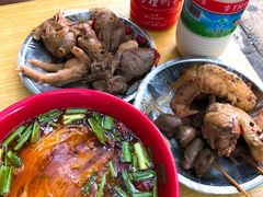 -梁老三麻辣鸡头总店