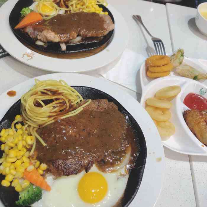 汤姆家的牛排(万达店)-"工作日晚上7:40到店,一桌都没有,害我.