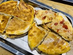 烤蒜蓉饼-名羊天下陕北横山铁锅炖羊肉(博文路店)