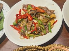酸木瓜炒牛肉-紫滇源云南生态菜(丹凤街店)