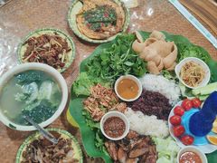 -沐毫傣泐云南菜孔雀宴•手抓饭傣味烧烤(曼听公园店)