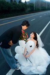 -雪中彩影婚纱摄影·微光艺术中心