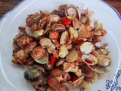 辣炒蛤蜊-1910老鲁味海鲜·戳子肉·青岛菜(金沙滩店)