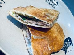 牛肉烤饼-肖四女乐山跷脚牛肉(江北星街坊店)