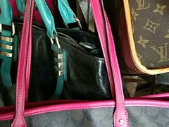 -京伟修鞋洗鞋奢侈品皮具护理店