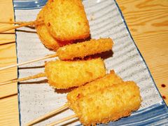 炸圆葱-晶吉·居酒屋·烧鸟·生鱼饭(中山区民主广场店)