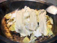 粘卷子-屯老二农家铁锅炖·行业领军者(梅江店)