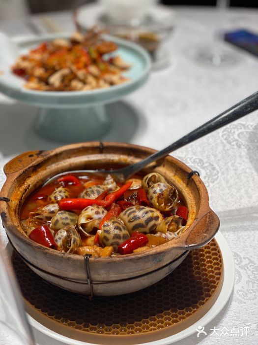 行家海鲜火锅酒家(静安寺店)辣酒煮花螺图片