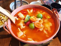 版纳野果酸汤鱼-云海肴·汽锅鸡·云南菜(天山百盛优客店)