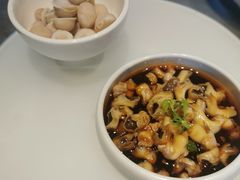 辣酒汁花螺配夏威夷果-木守西溪溪隐餐厅