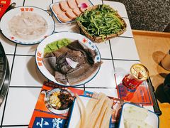 屠场鲜毛肚-喜悦小串丹东小黄牛海鲜烧烤大排档(民主广场店)