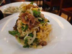 脆酸菜炝拌香螺-东方饺子王(新奥购物中心店)