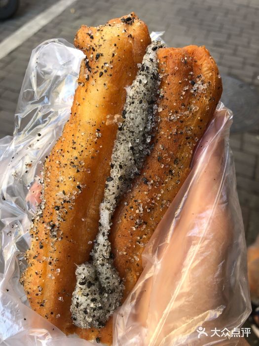 抚州弄口油条摊油子包麻子图片