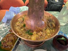 土司铜锅油焖鸡-浩海火烧云傣家菜(京广店)