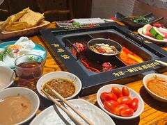 -老牌坊云南鱼豆花火锅(哈西万达店)
