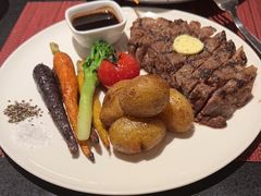 碳烤战斧牛排配红酒汁-WOLFGANG PUCK KITCHEN & BAR(迪士尼小镇店)