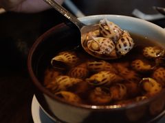 古越陈酿煮花螺-杭州西子湖四季酒店·金沙厅