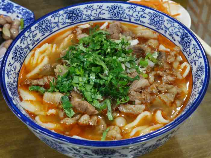 四十里铺羊肉面-"店地址:风城三路西安市第三医院北门对面.