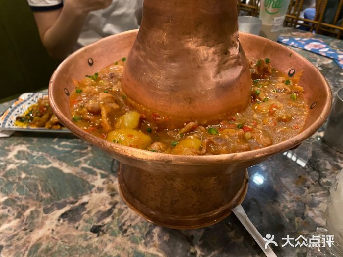 浩海火燒雲傣家菜(静安芮欧店)土司铜锅油焖鸡图片