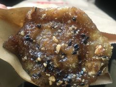 对面店铺的梅花饼-温岭特色嵌糕(开元店)