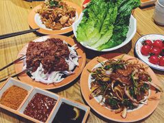 招牌爆腌儿去骨鸡腿肉-北京小炮儿炙子烤肉·铜锅涮肉(南京弘阳广场店)