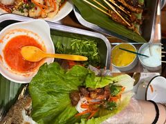-沐毫傣泐云南菜孔雀宴•手抓饭傣味烧烤(曼听公园店)
