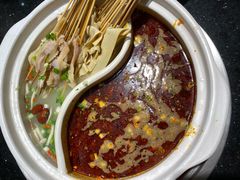 -明何记涮牛肚(品牌首店隋唐植物园南门古城路店)