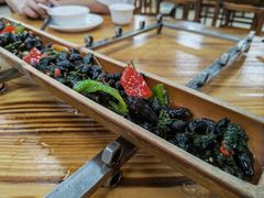 紫苏炒山坑螺-竹一味·竹筒饭
