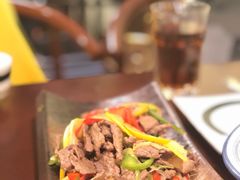酸木瓜炒牛肉-紫滇源云南生态菜(丹凤街店)