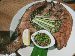 烤罗非鱼-蜗牛的家旅行主题云南菜餐厅.小酒馆(护国寺店)