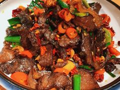 白辣椒炒腊牛肉-唐伯虎新派湘菜馆(石夏时代广场店)
