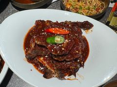 -草家酱蟹炭火烤肉店(珲春南路二店)