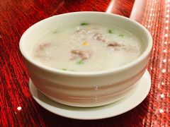 鲜牛展菜心粒咸蛋粥-广州逸林假日酒店·四季桃源中餐厅(白云山风景区店)