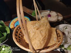 -老牌坊云南鱼豆花火锅(哈西万达店)