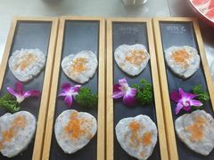 -明何记涮牛肚(品牌首店隋唐植物园南门古城路店)