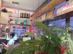 -明何记涮牛肚(品牌首店隋唐植物园南门古城路店)