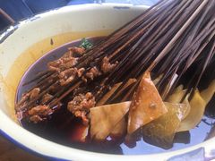 -拈签一笑黄牛肉辣卤串串