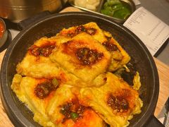 石板煎豆腐-草家酱蟹炭火烤肉店(珲春南路一店)