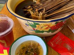 -拈签一笑黄牛肉辣卤串串