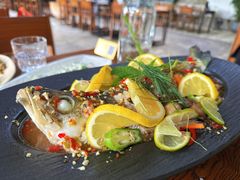 香柠酸辣明炉海鲈鱼-喜洲吧·江畔老船厂·庭院餐厅(喜临院店)