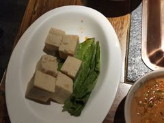 -老牌坊云南鱼豆花火锅(哈西万达店)