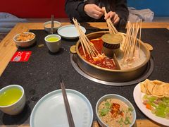 -明何记涮牛肚(品牌首店隋唐植物园南门古城路店)