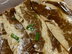 秘制肥牛-草家酱蟹炭火烤肉店(珲春南路一店)
