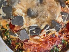 -黄利砖万峰林布依特色酸笋牛肉馆