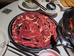 -茅草房·河畔园林火锅